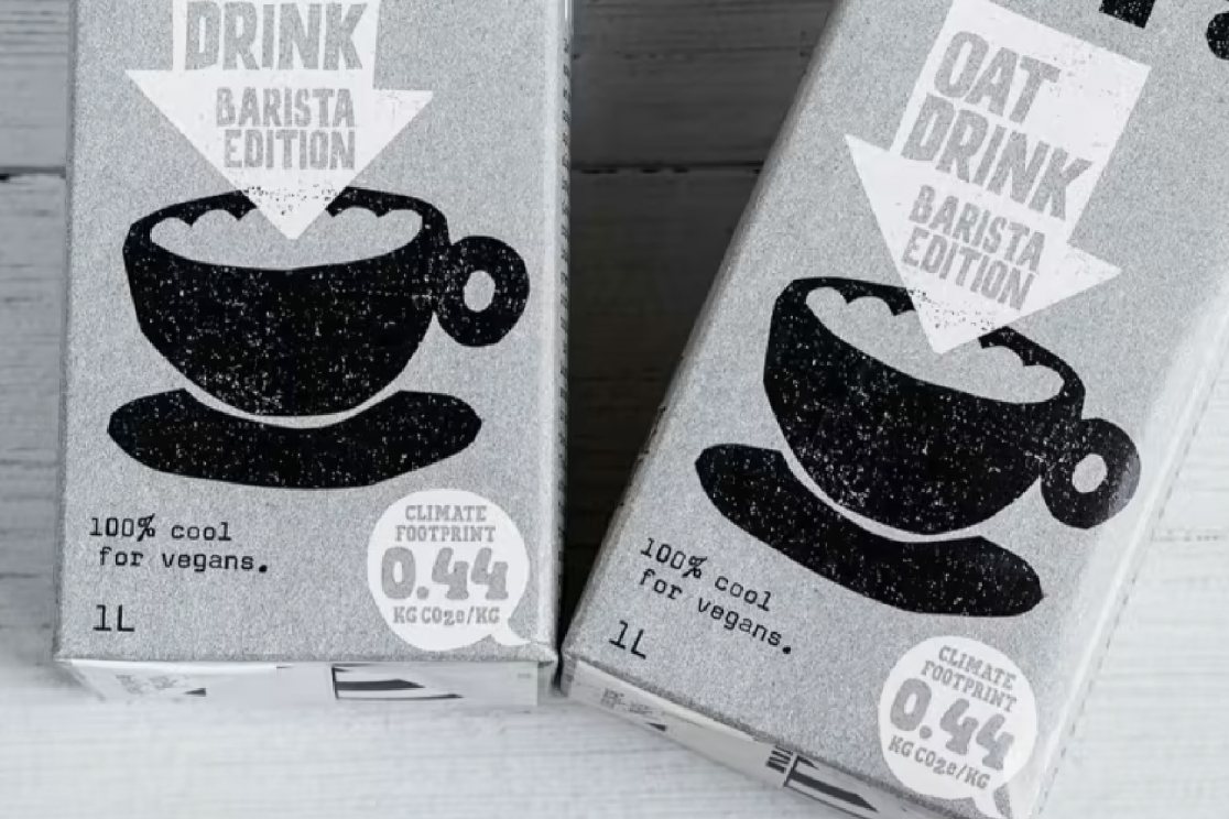 Oat drink cartons carrying a CarbonCloud climate footprint label
