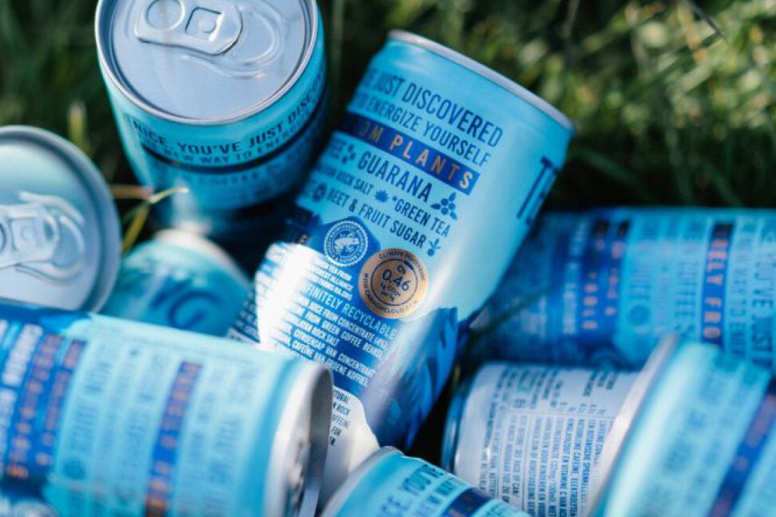 TENZING Natural Energy cans in the grass